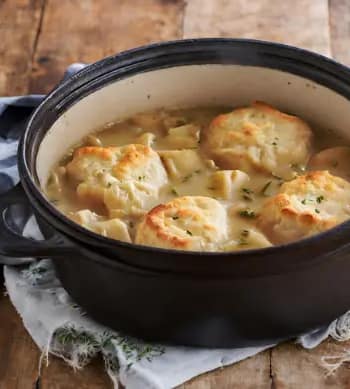 Dutch Oven Chicken and Dumplings with Biscuits
