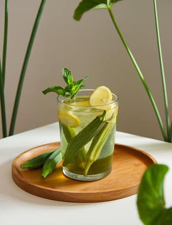 a photo of a glass of okra water on a wo jrRQV4ReTm aImqEUtDYg SY9TZ ggSv